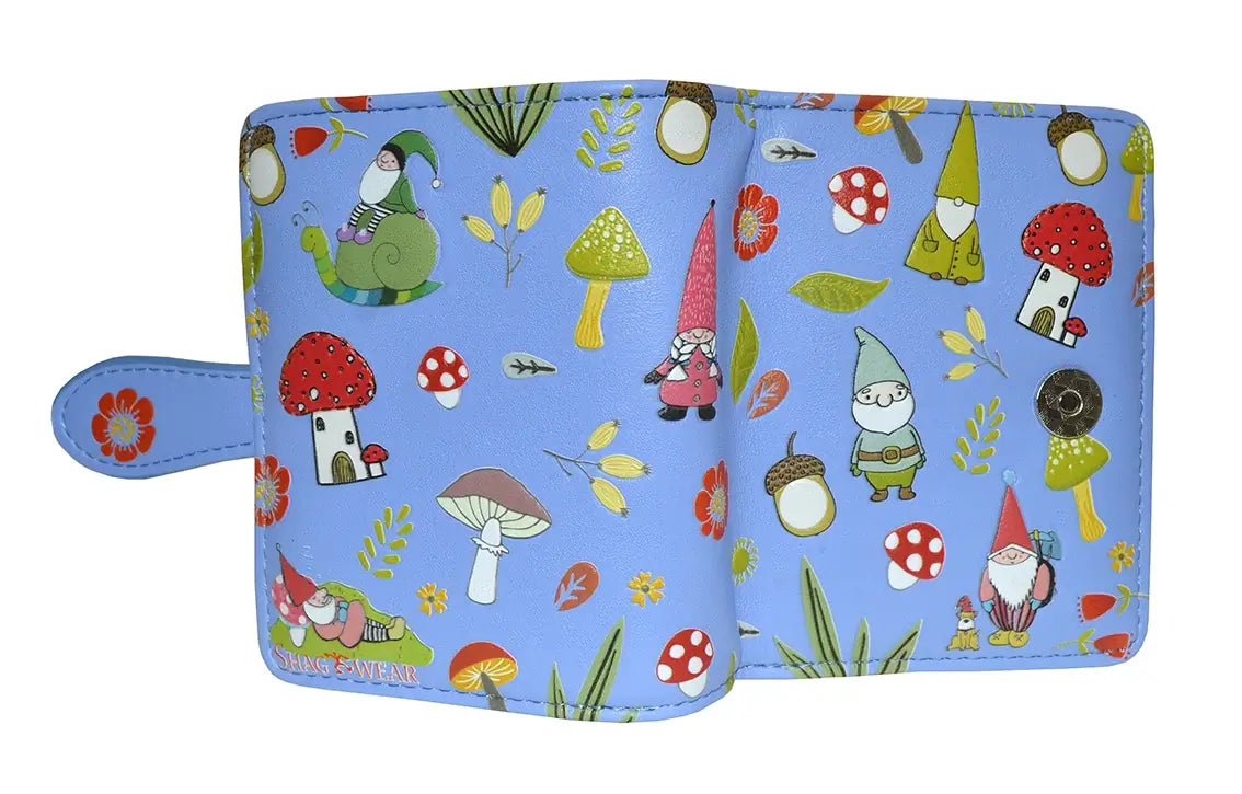 This wallet has a blue outer surface features a charming design with festive forest gnomes and mushrooms, acorns, and other woodsy plants.