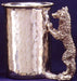 pewter cup with wolf standing with limbs attached to cup for handle