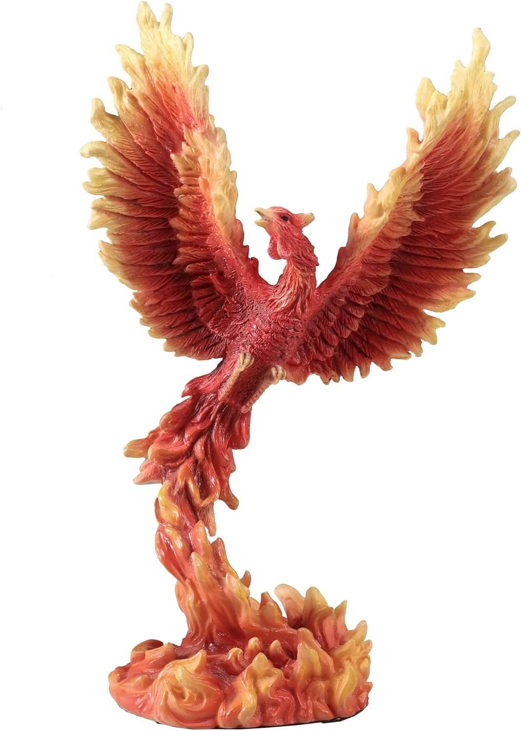 Figurine of a red, orange and yellow firebird rising from the flames