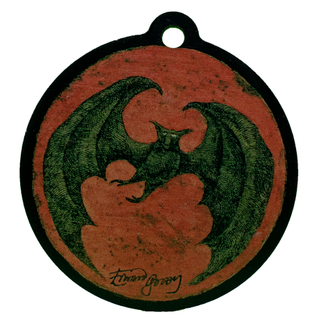 Ornament with a green bat by Edward Gorey