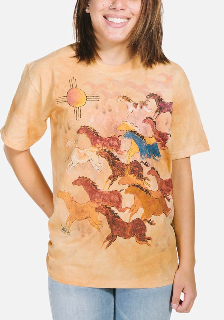 Mottled yellow-brown shirt with herd of horses and sun in Native American art style