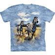 T-shirt with a design of two zebras in a field on a blue tie-dye background