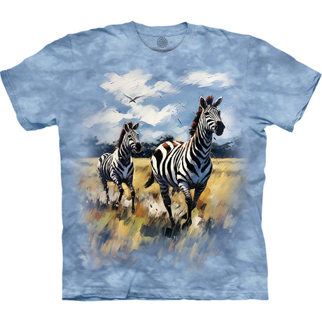 T-shirt with a design of two zebras in a field on a blue tie-dye background