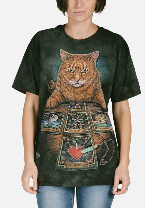 Black mottled tee shirt with orange tabby cat sitting in front of tarot cards and crystal