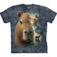 A short-sleeve crewneck t-shirt featuring a detailed graphic print of a capybara. The left side of the capybara face is rendered in realistic brown fur, while the right side blends into a scenic forest landscape with a smaller capybara standing in water under a glowing sky.