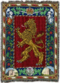 Tapestry blanket with a gold lion emblem on a red background, surrounded by heraldic elements.