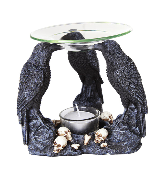 Oil burner featuring three black ravens and skulls