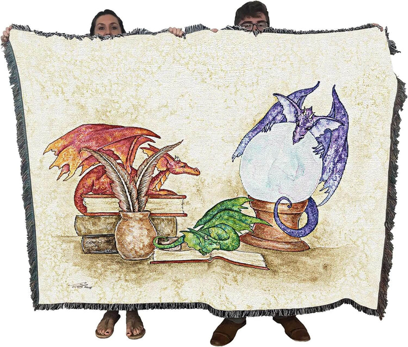 Dragon blanket held up by two adults to show large size