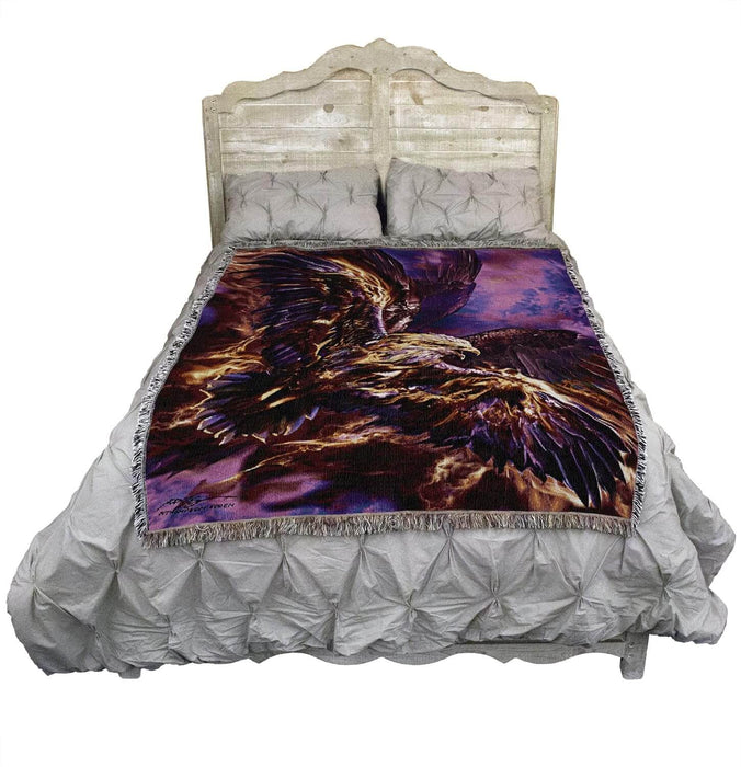 Firebird tapestry shown on a bed