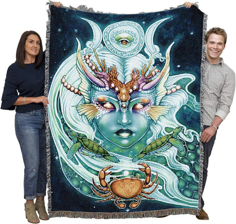 Tapestry blanket with face of nautical goddess, moon phases, turtles and crab held by two adults to show large size