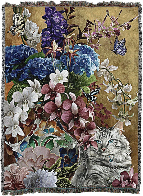 Tapestry blanket with blue eyed gray tabby cat and floral arrangement in a vase with butterflies