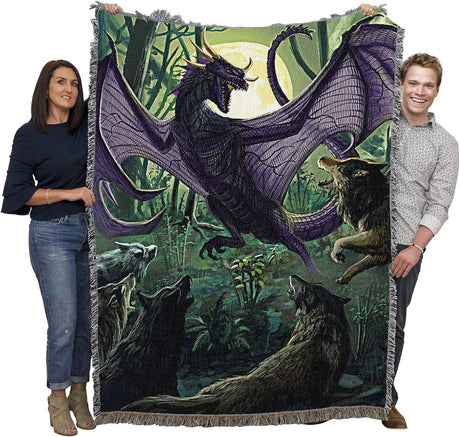 Tapestry blanket by Piya Wannachaiwong with black dragon facing off against pack of five wolves, held by adults to show large size