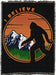Tapestry blanket - Bigfoot silhouette against mountains with orange, text "I BELIEVE"