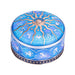 Round blue trinket box with gold sun and stars and silver Zodiac signs
