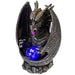 Faux-stone dragon backflow incense burner with orb. Shown with LED on