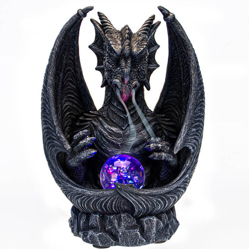 Faux-stone dragon backflow incense burner with orb. Shown with LED turned on to make it glow