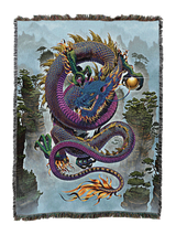 Colorful purple dragon design on a woven blanket with a scenic background