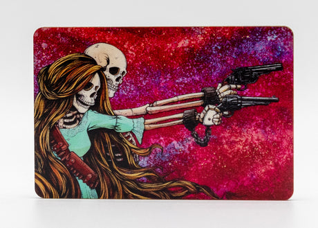 Magnet with a skeleton couple, each holding a gun against a colorful background