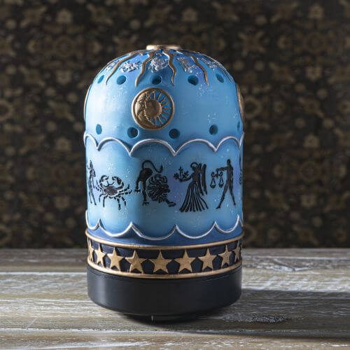 Aroma lamp with zodiac symbols on blue with metallic gold and silver celestial accents