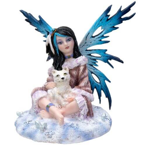 Fairy with blue wings sitting in the snow with a white wolf cub