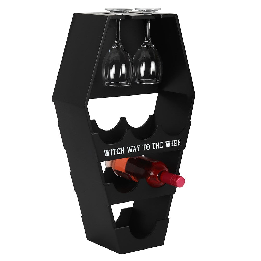 Wine rack in black, coffin shape, with text "Witch way to the wine" shown with wine and glasses