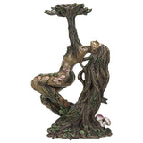 Candle holder shaped like an ent tree-woman/nymph, arms and hands reaching up to form holder