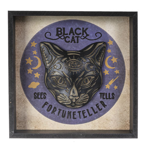 Framed artwork of a black cat with text 'Black Cat Sees Fortuneteller Tells' on a purple circle background.