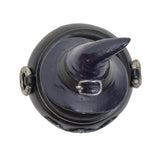 Trinket box of a gray cauldron with gold moon and pentagram, and cat in witch hat on the lid, shown top down