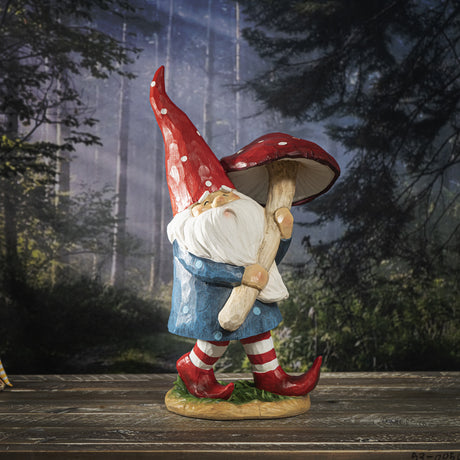 Faux-wood resin figurine of gnome in blue shirt, red hat, carrying mushroom