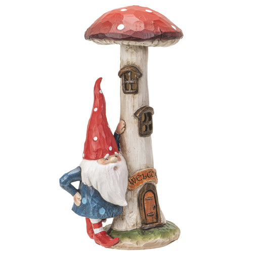 Figurine of mushroom house with windows and gnome in blue and red