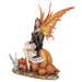 Brunette fairy with orange wings in black and white dress sitting on pumpkin next to more gourds, mushroom, and winged fairy cat
