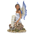 Fairy figurine by Amy Brown, pixie sitting on snail shell, blue tinged wings and striped stockings