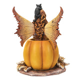 Amy Brown figurine of fairy in pumpkin with black cat on head and two more in pumpkin face, shown from back