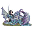 Figurine of a dragon with purple and blue napping on a fairy in a teal dress with black-purple hair