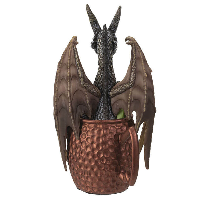 Moscow mule dragon in gray and tan sitting in faux copper mug, shown from the back