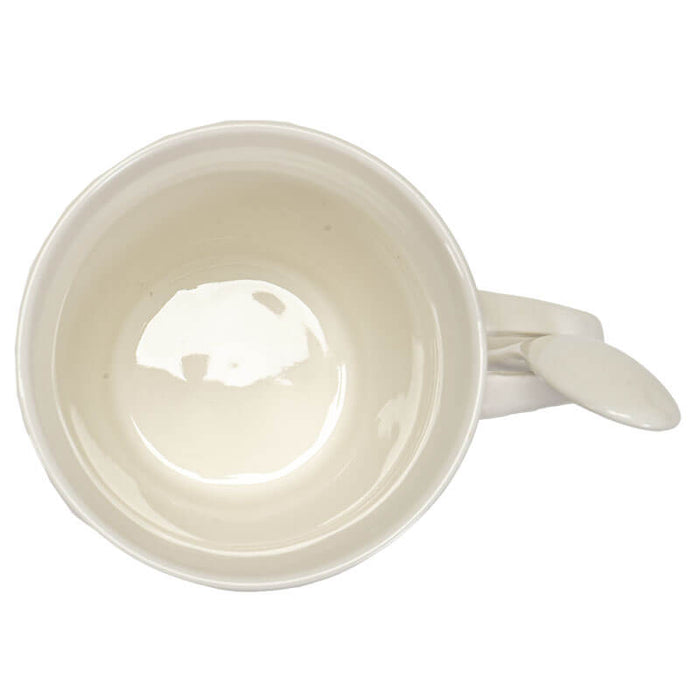 Top down view of mug and spoon