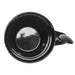 Top down view of black mug with spoon in handle