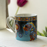 Colorful mug with a horse design and Southwestern patterns on a black background