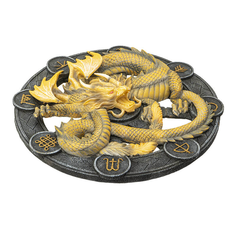 Imbolc dragon plaque showing yellow serpent dragon on a black wheel with runic symbols