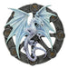 Icy blue silver dragon representing Yule on a black wheel with gold symbols