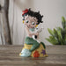 Figurine of Betty Boop as a mermaid with Pudgy the dog on the sand