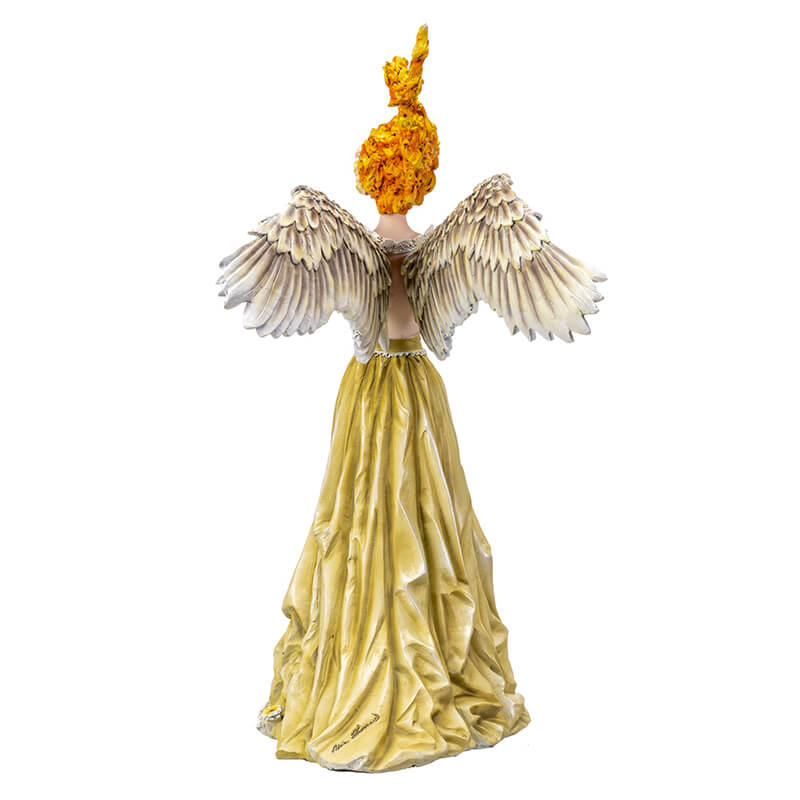 Figurine of lady with feathered angel wings and fire hair with flower adorned pale green dress, back view