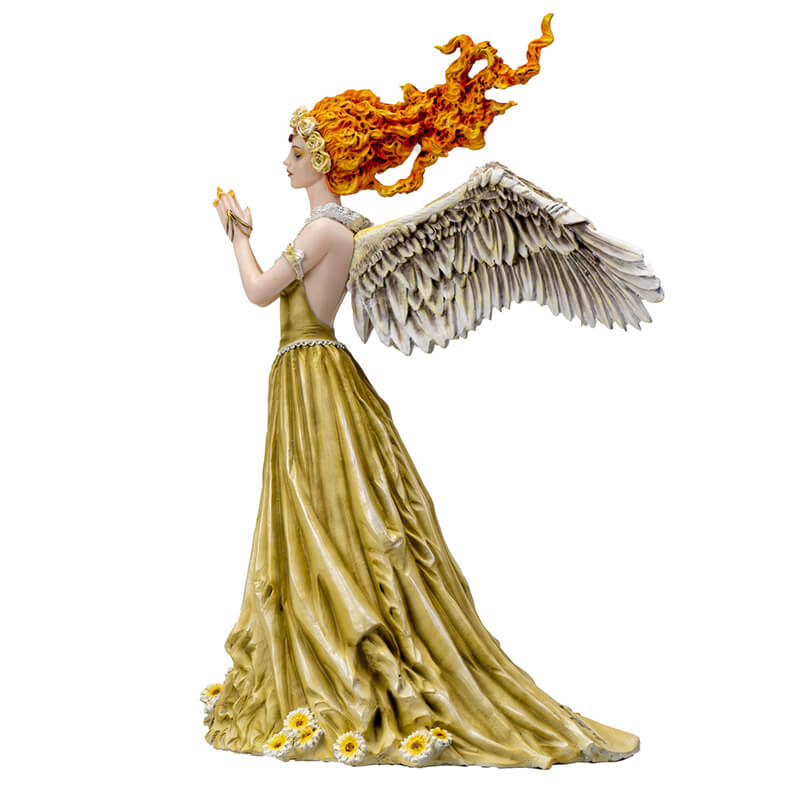 Figurine of lady with feathered angel wings and fire hair with flower adorned pale green dress