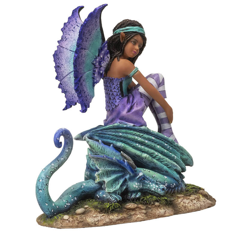 Figurine of fairy with braided hair, aqua and purple outfit sitting with teal and blue dragon