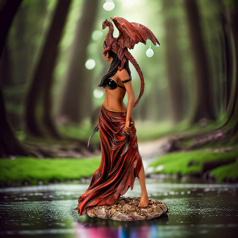 Figurine of tanned woman with dark hair standing with a knife, a red dragon perched on her shoulder.