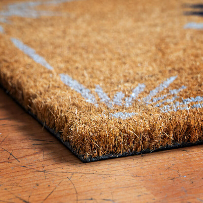Coir (coconut fiber) top of doormat