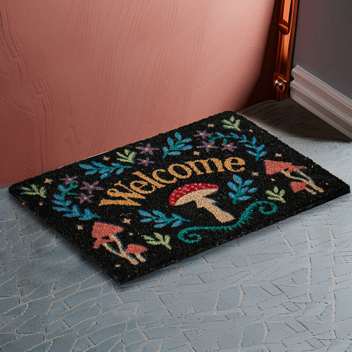 Doormat with the word "Welcome" surrounded by leaves, flowers and mushrooms.