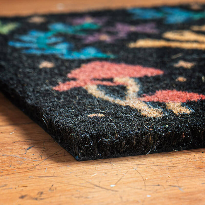 Closeup of welcome mat, coir coconut fiber material