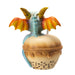 Figurine of blue dragon with red and gold accents sitting in Boba Tea (labeled in blue). Back view