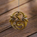 Ornament with golden dragon in a circular design